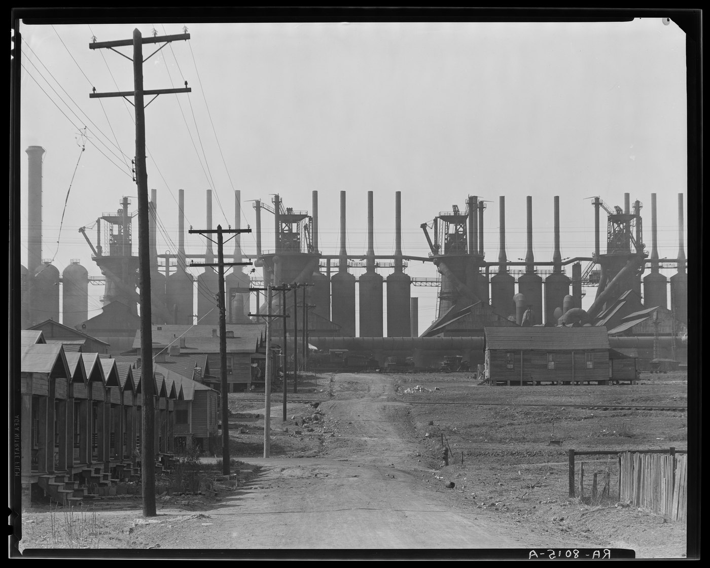 A steel mill and workers' houses at Birmingham, Alabama, photographed by Walker Evans in March 1936