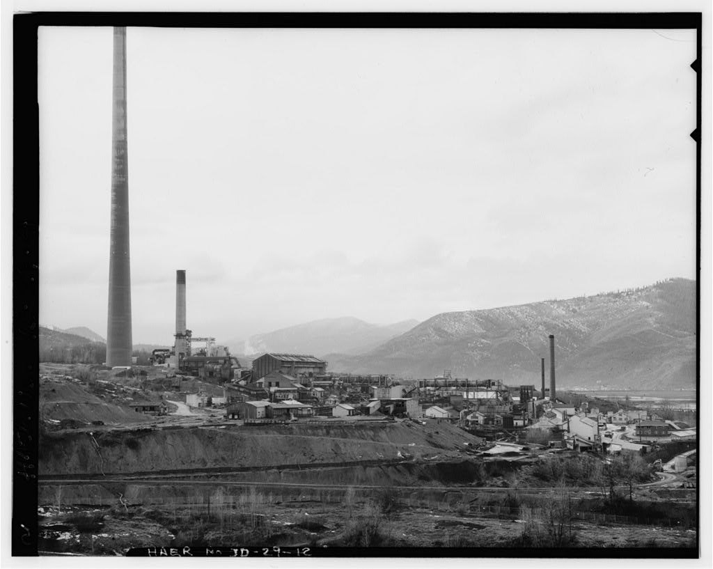 Bunker Hill lead smelter seen from the ridge above Government Gulch, with the bag house and the 715-foot stack in the background