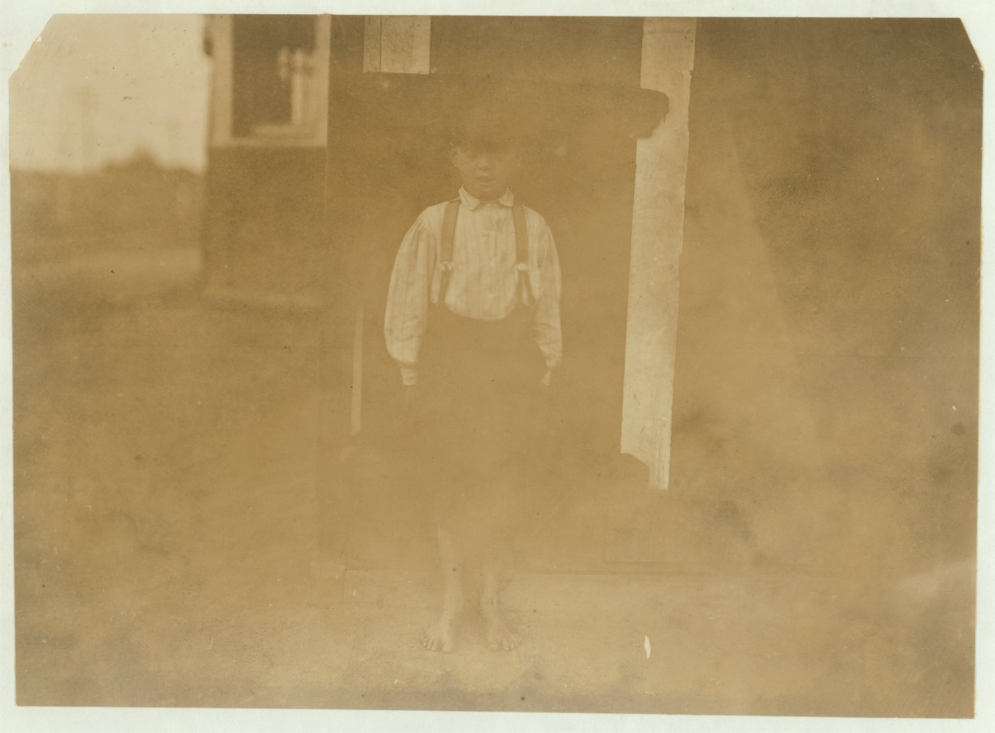 Herman Parker, a small boy, photographed by Lewis Hine at Kannapolis in 1912